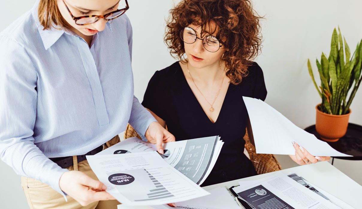 Two Women Reviewing Documentation