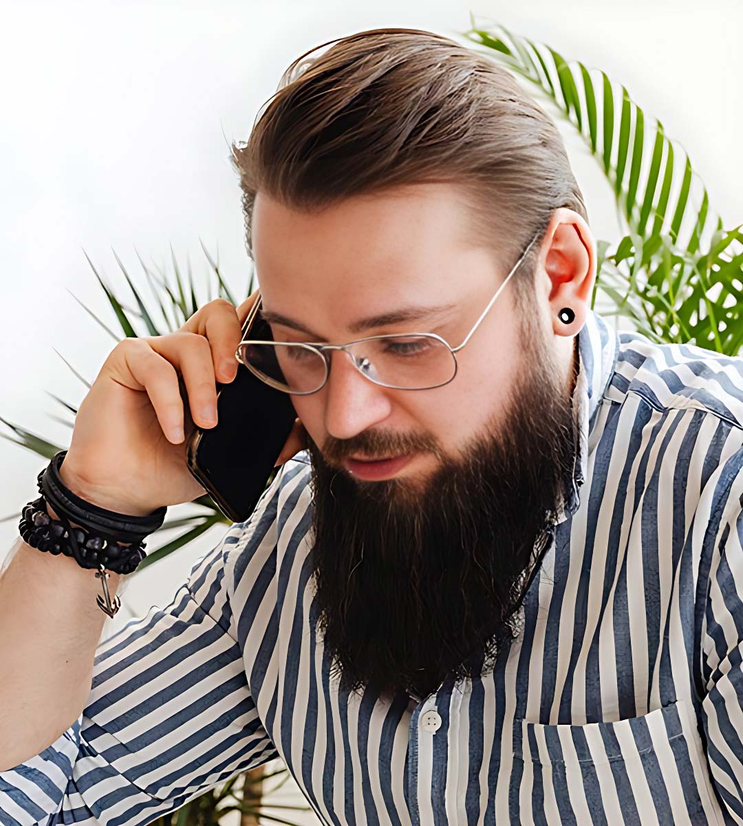 Man with Long Beard on Phone